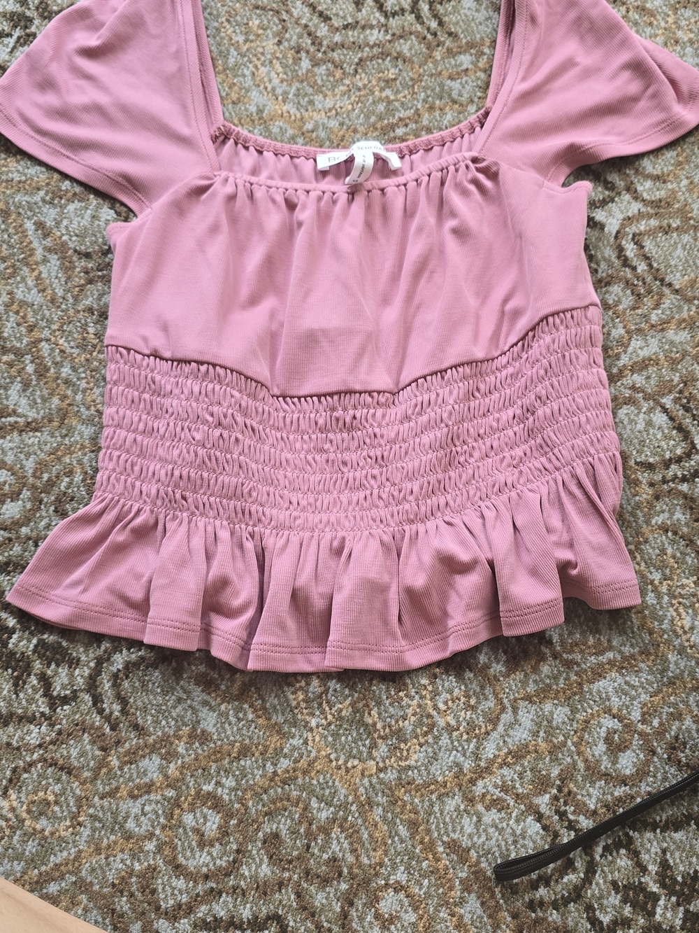 BCBGeneration Dusty Rose Smocked Peplum Top